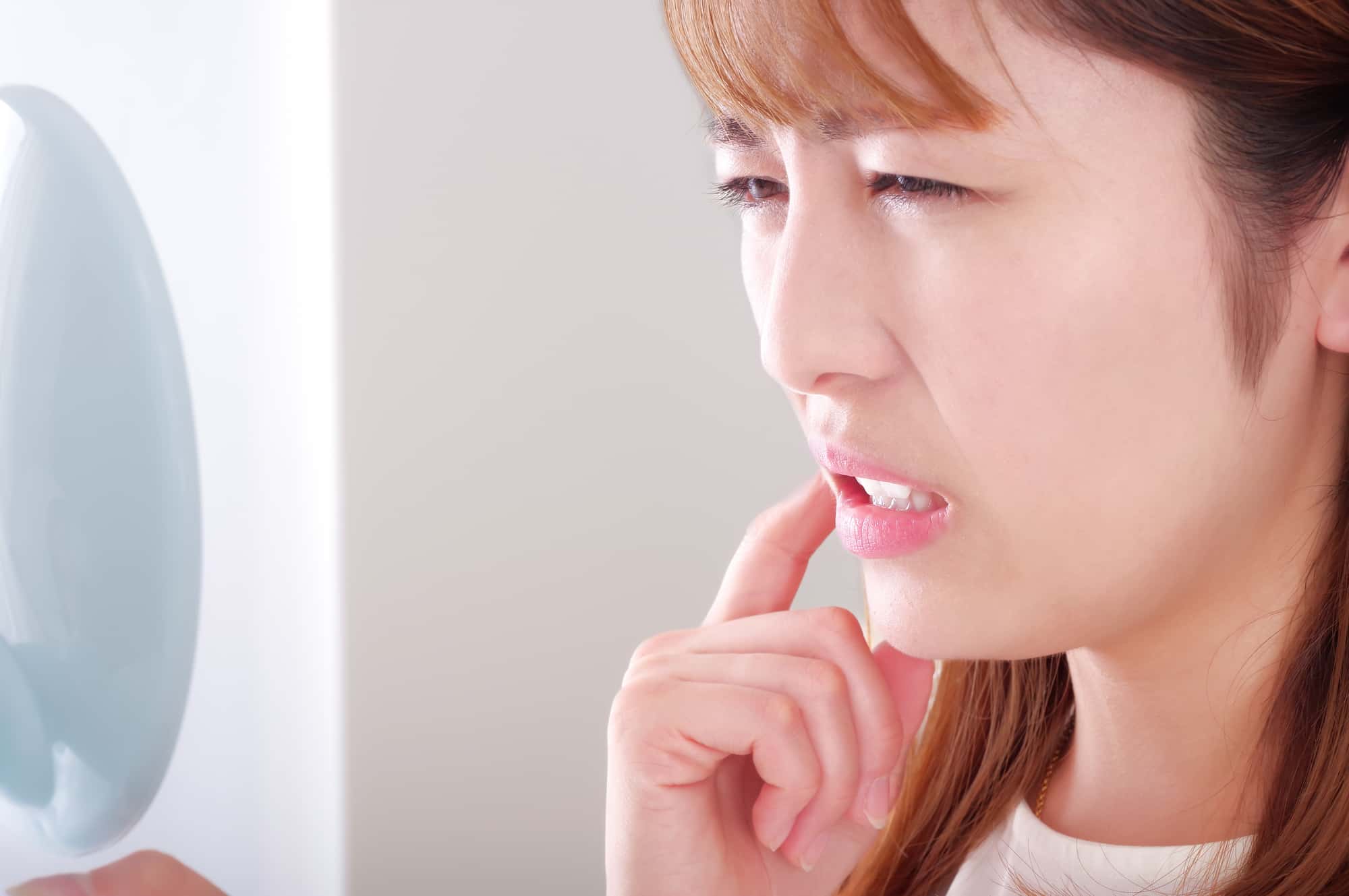 虫歯の治療後に痛みが出た女性